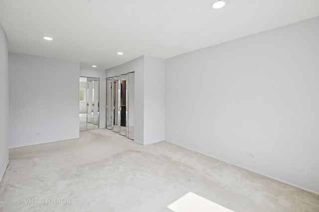 9331 Landings Ln Unit 204, Des Plaines, IL 60016 - empty room with recessed lighting and light colored carpet