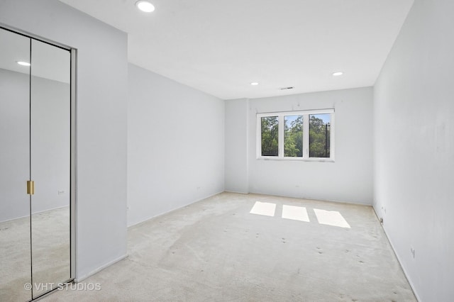 9331 Landings Ln Unit 204, Des Plaines, IL 60016 - unfurnished bedroom featuring carpet flooring, recessed lighting, and a closet