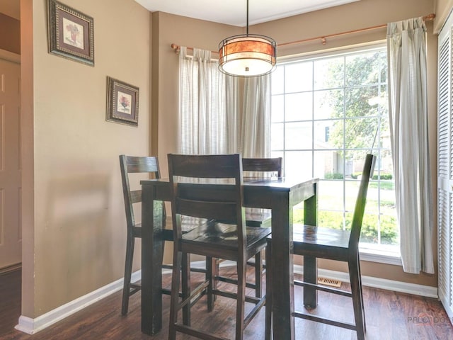 6797 Roanoake Ct, Gurnee, IL 60031 - dining area featuring healthy amount of natural light and wood finished floors