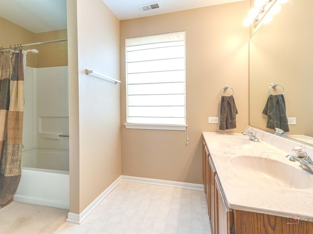 6797 Roanoake Ct, Gurnee, IL 60031 - full bathroom with double vanity and shower / bathtub combination with curtain
