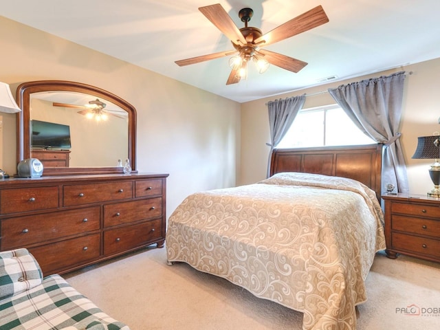 6797 Roanoake Ct, Gurnee, IL 60031 - bedroom with light colored carpet and ceiling fan