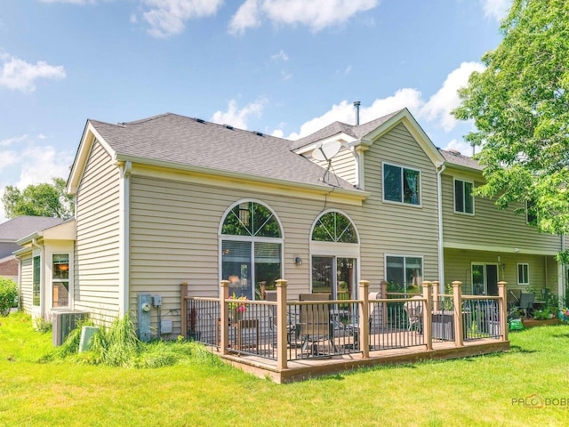 6797 Roanoake Ct, Gurnee, IL 60031 - rear view of property with a yard and a shingled roof