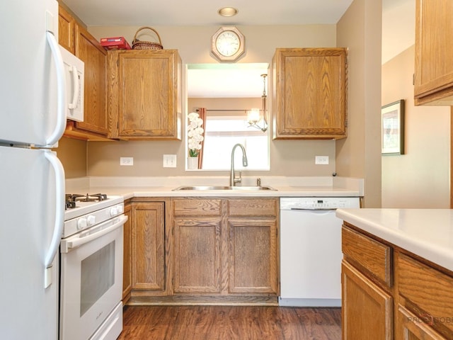 6797 Roanoake Ct, Gurnee, IL 60031 - kitchen featuring white appliances, light countertops, dark wood-style flooring, and recessed lighting