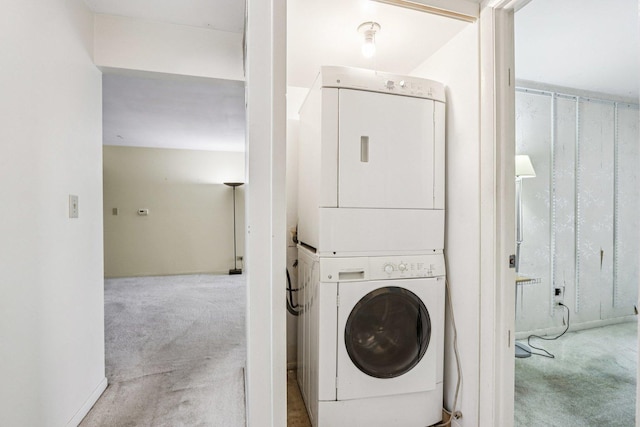 1495 S County Farm Rd Unit 2-4, Wheaton, IL 60189 - laundry area with estacked washer and dryer and carpet floors