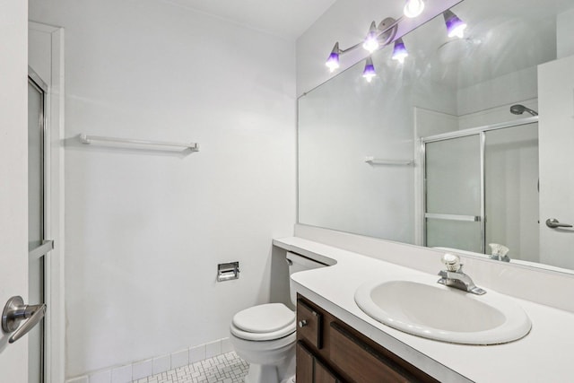 1495 S County Farm Rd Unit 2-4, Wheaton, IL 60189 - bathroom featuring a shower with shower door, vanity, and tile patterned flooring