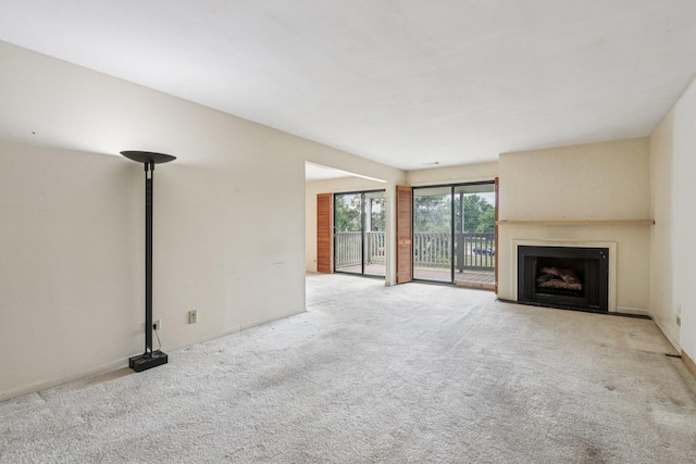 1495 S County Farm Rd Unit 2-4, Wheaton, IL 60189 - unfurnished living room with carpet floors and a fireplace with flush hearth
