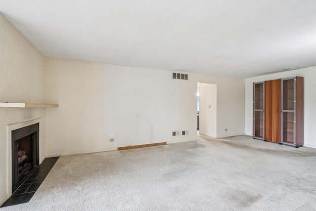 1495 S County Farm Rd Unit 2-4, Wheaton, IL 60189 - unfurnished living room with a fireplace with flush hearth and carpet