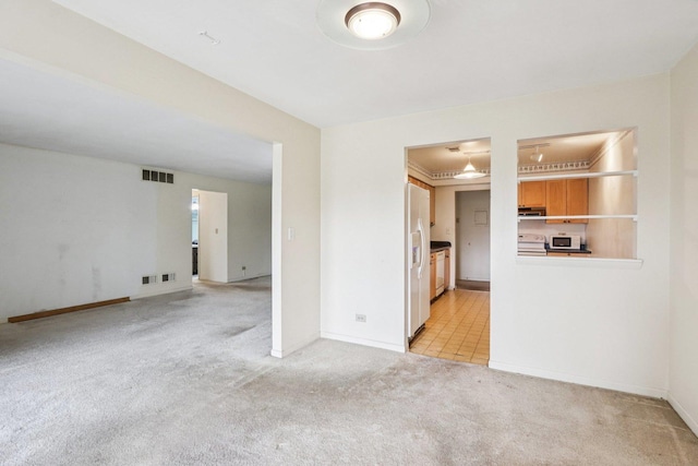 1495 S County Farm Rd Unit 2-4, Wheaton, IL 60189 - spare room with light carpet and baseboards