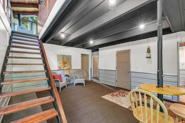 131 Shawnee Ln, Loda, IL 60948 - basement with dark colored carpet, stairway, and wainscoting