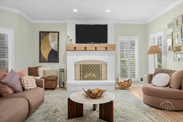 0N423 Armstrong Ln, Geneva, IL 60134 - living room with crown molding, wood finished floors, recessed lighting, and a fireplace