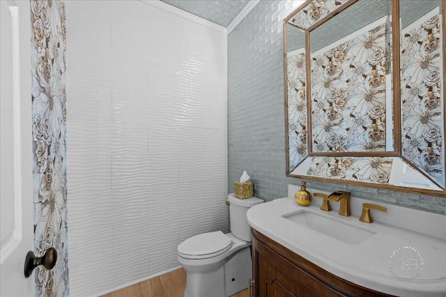 0N423 Armstrong Ln, Geneva, IL 60134 - bathroom featuring crown molding, vanity, tile walls, and wood finished floors