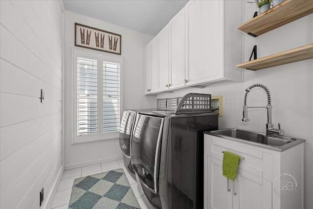 0N423 Armstrong Ln, Geneva, IL 60134 - washroom featuring washer and dryer, cabinet space, and light tile patterned floors