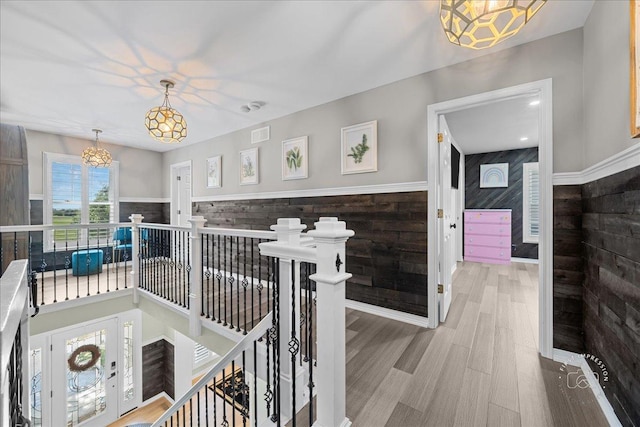 0N423 Armstrong Ln, Geneva, IL 60134 - hallway with an upstairs landing, a chandelier, and wood finished floors