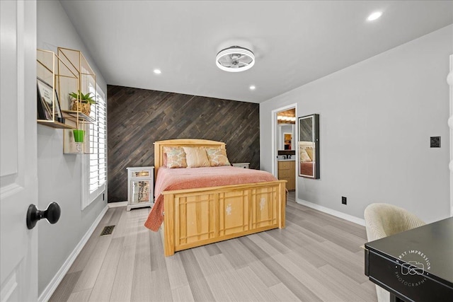 0N423 Armstrong Ln, Geneva, IL 60134 - bedroom featuring an accent wall, light wood finished floors, recessed lighting, and wooden walls