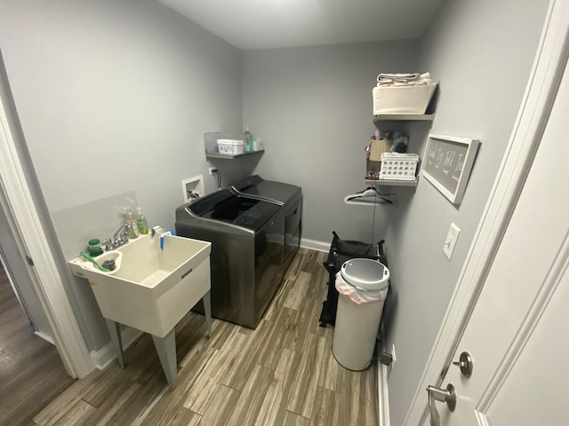 7009 W Crandall Ave, Worth, IL 60482 - laundry area with washing machine and clothes dryer and wood finished floors
