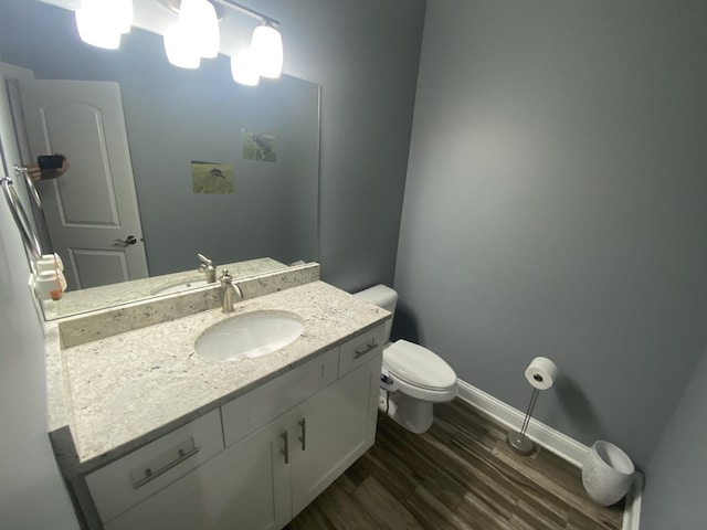 7009 W Crandall Ave, Worth, IL 60482 - bathroom featuring wood finished floors and vanity