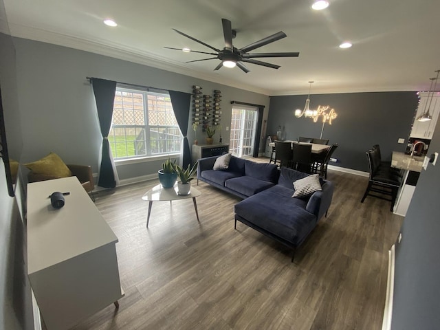 7009 W Crandall Ave, Worth, IL 60482 - living room featuring ornamental molding, a ceiling fan, a chandelier, dark wood-style floors, and recessed lighting
