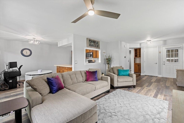 1801 Pebble Beach Cir Unit 1, Elk Grove Village, IL 60007 - living area with wood finished floors, a ceiling fan, and a chandelier
