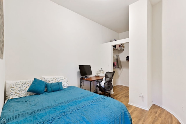 1000 E 53rd St Unit 501, Chicago, IL 60615 - bedroom featuring wood finished floors and a spacious closet
