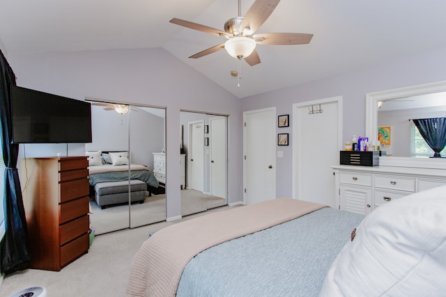 1622 Orchard Ave, Schaumburg, IL 60193 - bedroom with light colored carpet, vaulted ceiling, multiple closets, and ceiling fan