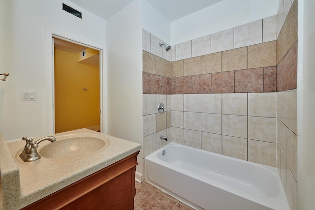 6333 N Francisco Ave Unit 2, Chicago, IL 60659 - full bath featuring washtub / shower combination, vanity, and tile patterned floors