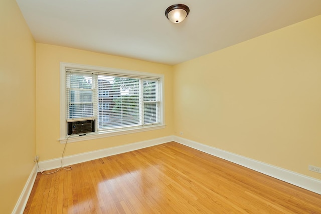 6333 N Francisco Ave Unit 2, Chicago, IL 60659 - unfurnished room featuring light wood-type flooring and cooling unit