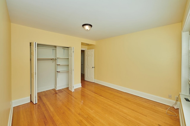6333 N Francisco Ave Unit 2, Chicago, IL 60659 - unfurnished bedroom with a closet and light wood-type flooring