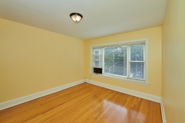 6333 N Francisco Ave Unit 2, Chicago, IL 60659 - unfurnished room featuring light wood finished floors and cooling unit