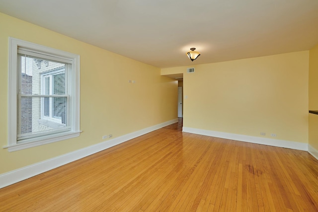 6333 N Francisco Ave Unit 2, Chicago, IL 60659 - spare room featuring light wood-type flooring and baseboards