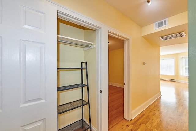 6333 N Francisco Ave Unit 2, Chicago, IL 60659 - closet featuring baseboard heating