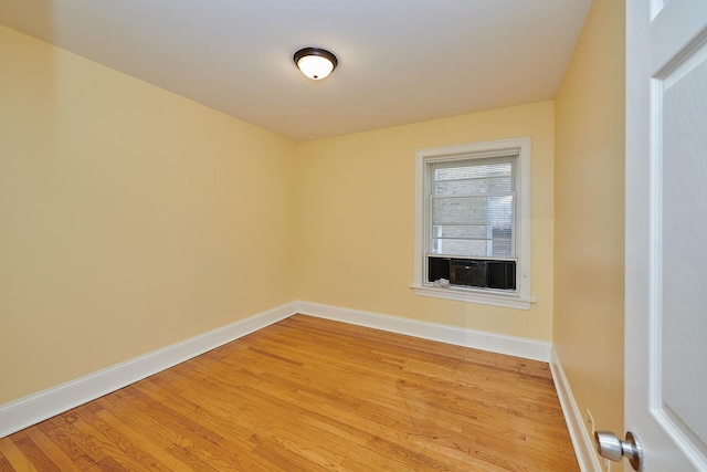 6333 N Francisco Ave Unit 2, Chicago, IL 60659 - empty room with light wood-style floors and cooling unit