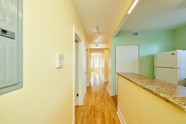 6333 N Francisco Ave Unit 2, Chicago, IL 60659 - corridor featuring light wood-style floors and track lighting
