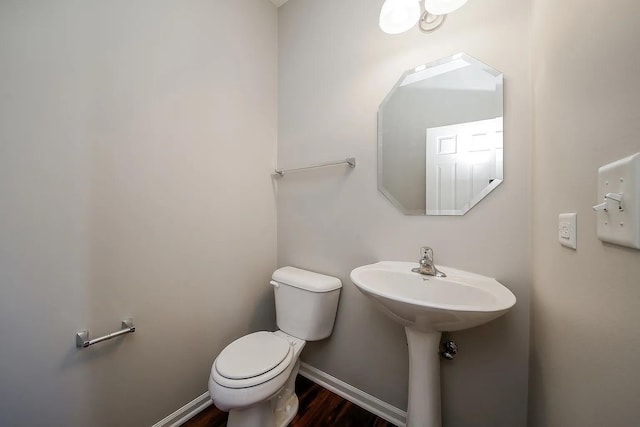4199 Milford Ln Unit 4199, Aurora, IL 60504 - half bath featuring toilet and wood finished floors