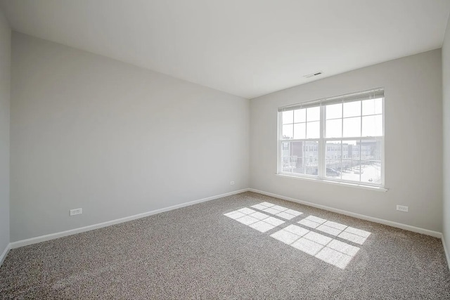 4199 Milford Ln Unit 4199, Aurora, IL 60504 - spare room with carpet floors and baseboards