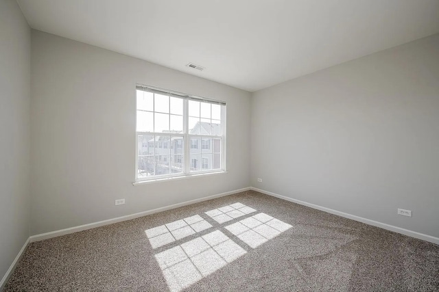 4199 Milford Ln Unit 4199, Aurora, IL 60504 - carpeted spare room with baseboards