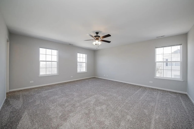 4199 Milford Ln Unit 4199, Aurora, IL 60504 - empty room featuring ceiling fan and carpet