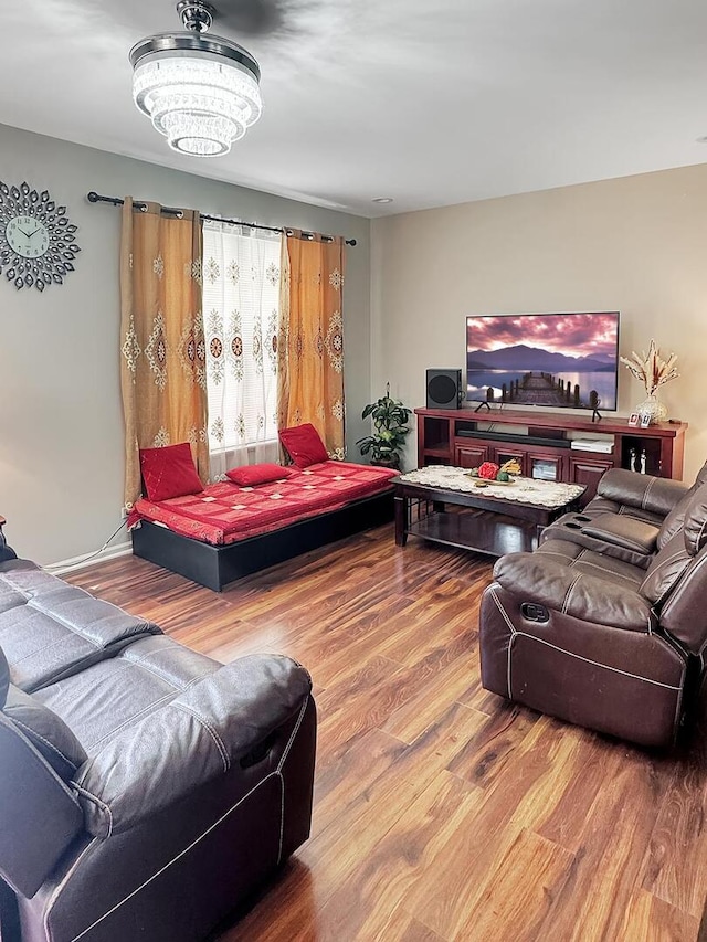 4199 Milford Ln Unit 4199, Aurora, IL 60504 - living area with wood finished floors and a chandelier