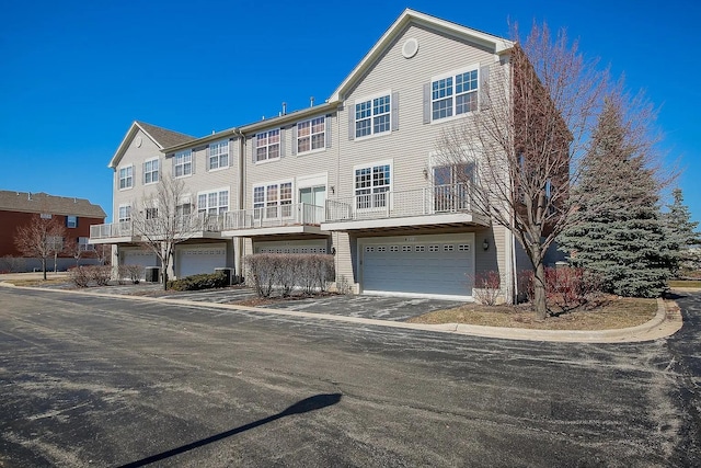 4199 Milford Ln Unit 4199, Aurora, IL 60504 - view of front facade featuring an attached garage