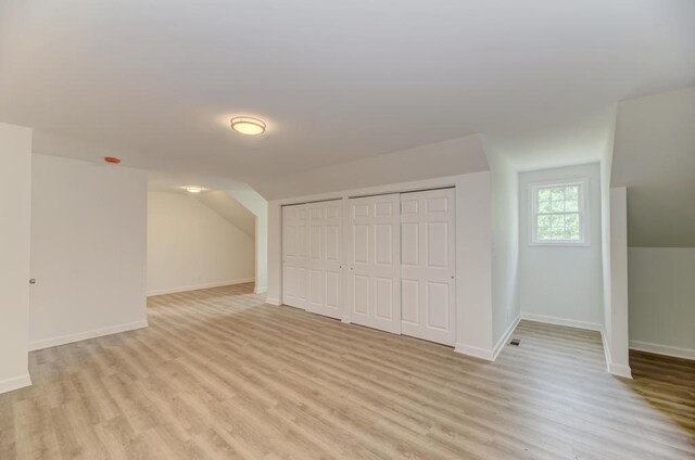 1927 Lakewood Dr, Wilmington, IL 60481 - additional living space featuring light wood-style floors and baseboards