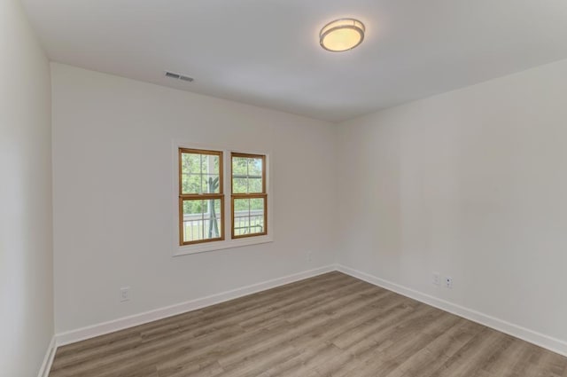 1927 Lakewood Dr, Wilmington, IL 60481 - spare room featuring wood finished floors