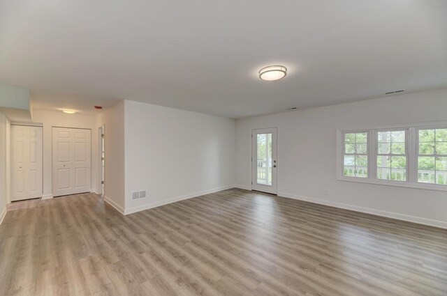 1927 Lakewood Dr, Wilmington, IL 60481 - spare room featuring light wood-style floors