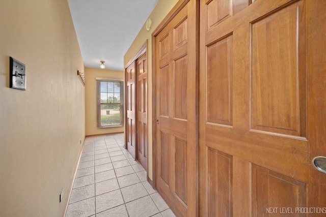 3609 Tamarisk Ct, Crystal Lake, IL 60012 - hallway with light tile patterned flooring and baseboards