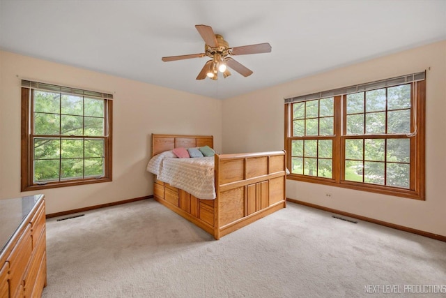 3609 Tamarisk Ct, Crystal Lake, IL 60012 - bedroom featuring multiple windows, light colored carpet, and a ceiling fan