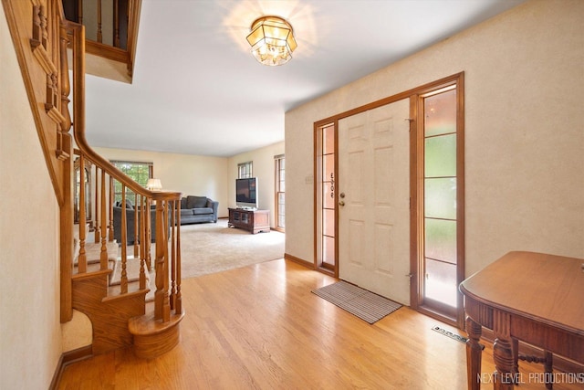 3609 Tamarisk Ct, Crystal Lake, IL 60012 - entrance foyer with light wood-style floors and stairs