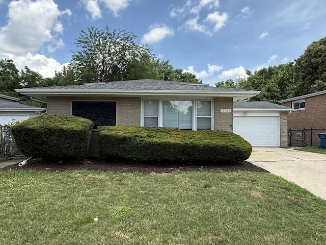 15125 Waterman Dr, South Holland, IL 60473 - view of front of house with brick siding, driveway, a garage, and roof with shingles