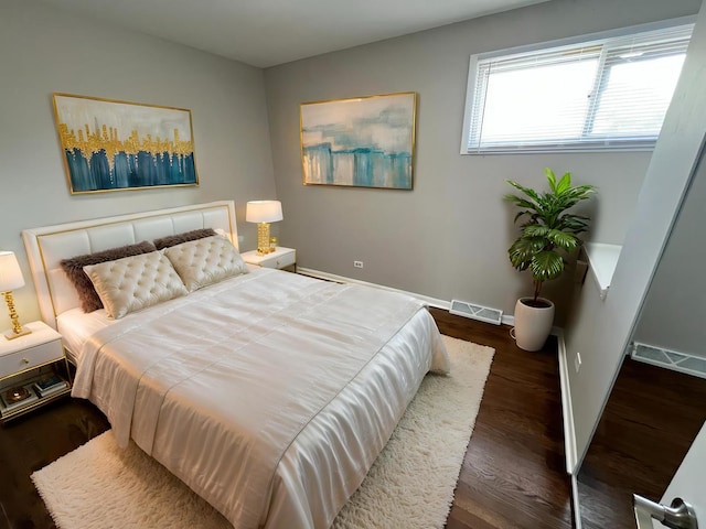 15125 Waterman Dr, South Holland, IL 60473 - bedroom featuring baseboards and wood finished floors