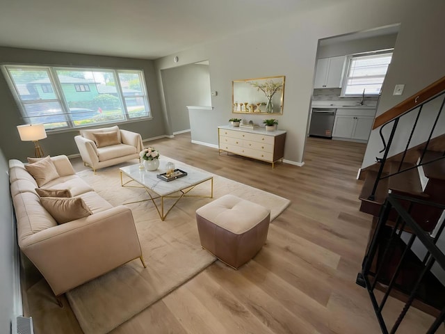 15125 Waterman Dr, South Holland, IL 60473 - living area featuring light wood finished floors and stairway