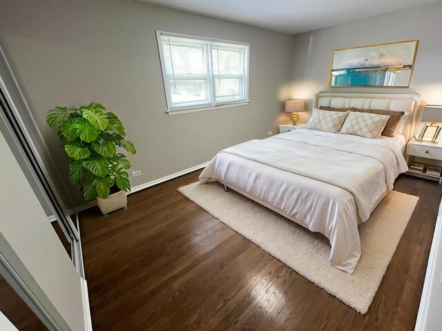 15125 Waterman Dr, South Holland, IL 60473 - bedroom with dark wood-style floors and baseboards