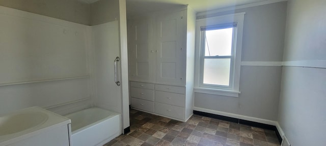 1325 21st Ave, Rockford, IL 61104 - bathroom with stone finish floors, plenty of natural light, tub / shower combination, and vanity