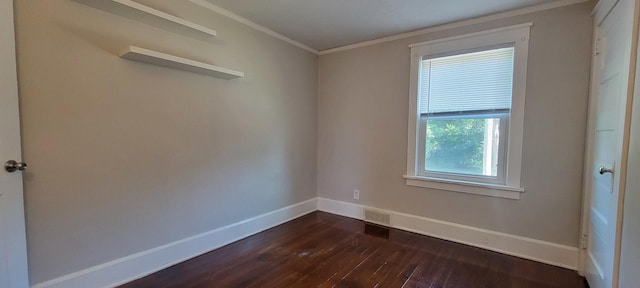 1325 21st Ave, Rockford, IL 61104 - empty room with dark wood-style floors and ornamental molding